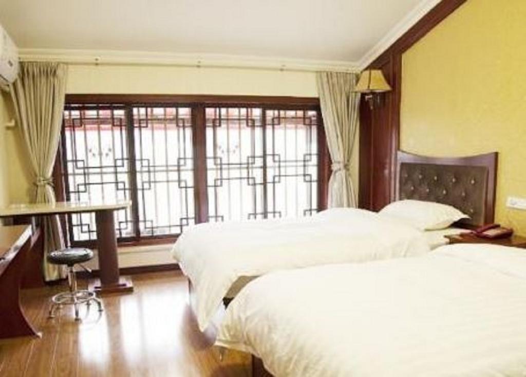 Xingzhou Hotel Leshan Chambre photo