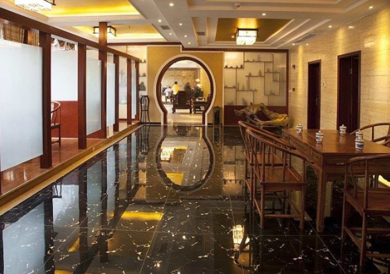 Xingzhou Hotel Leshan Extérieur photo